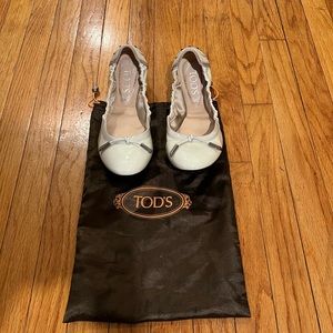 Tods 37 1/2 cream patent leather folding flats